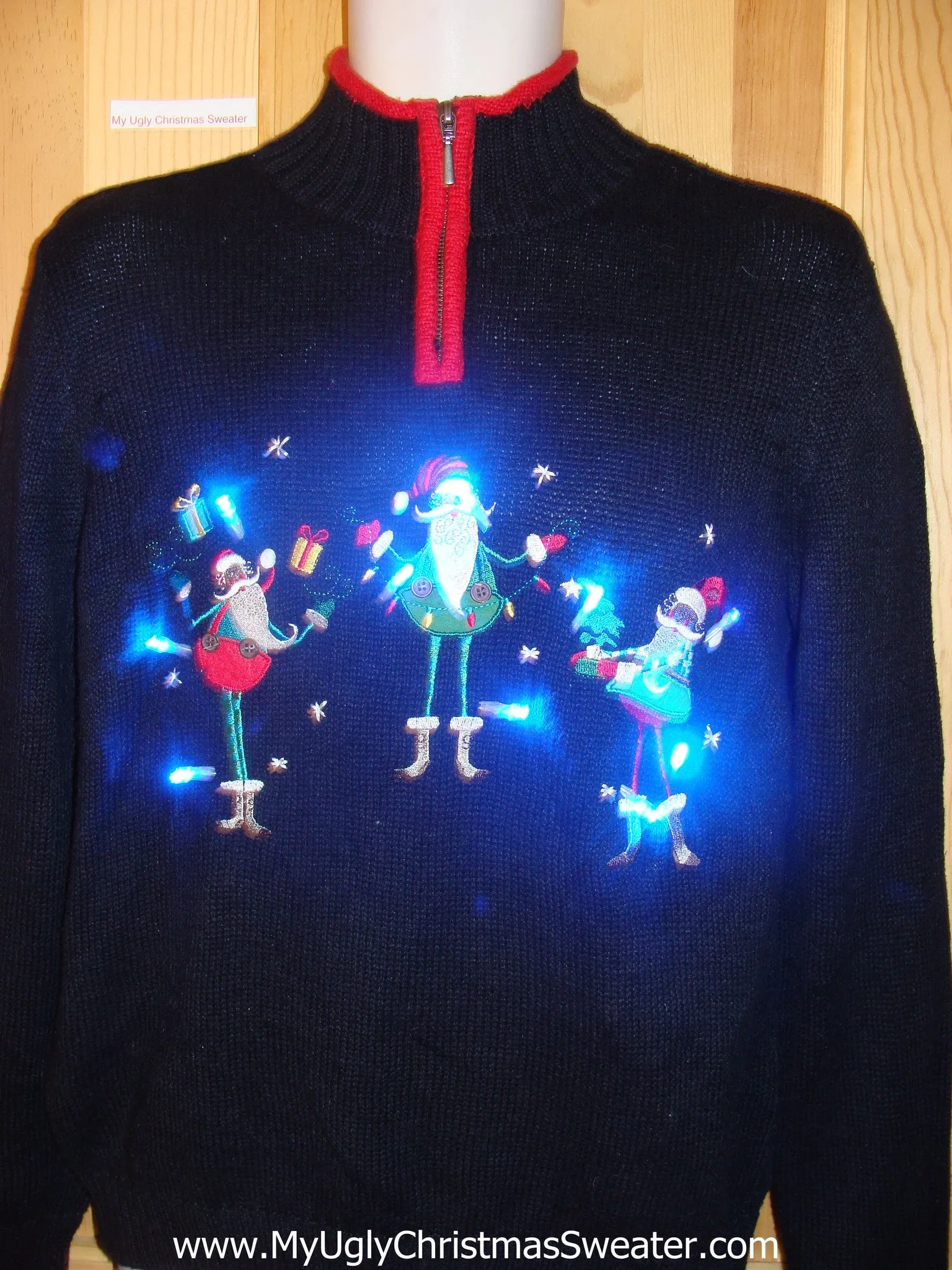 Tacky Crazy Light Up Christmas Sweater Santa Juggling Gifts